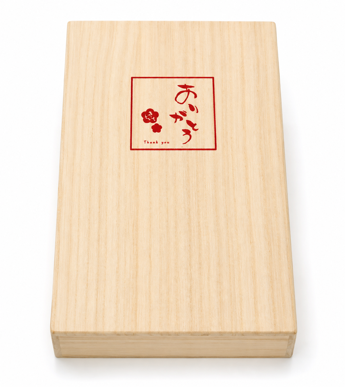 Paulownia wood gift box stamped with おりがとう (arigatou — Thank You) in red ink — Japanese chopstick gift set packaging, made in Japan
