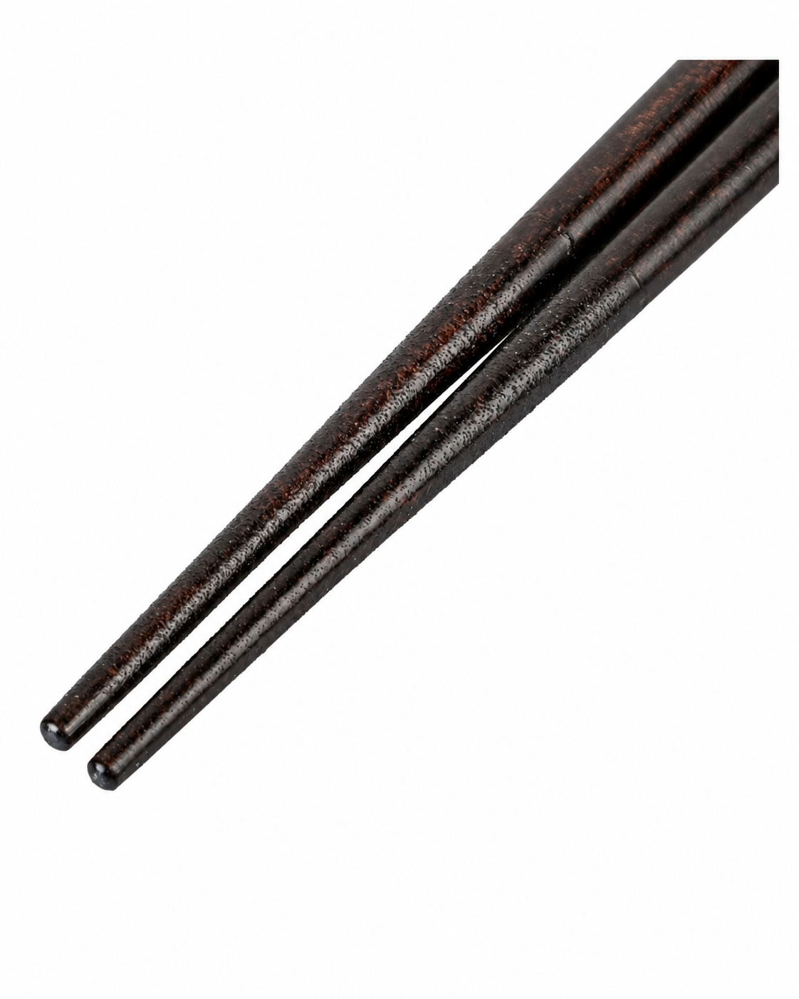 Close-up of dark lacquered pointed tips of Japanese chopsticks, showing rich dark brown wood grain texture"