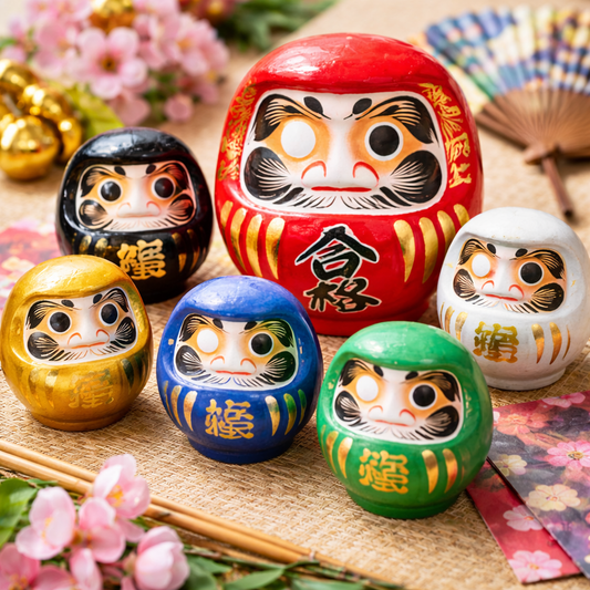 Japanese Daruma dolls in multiple colours, handmade and hand-painted in Japan, symbols of luck, success and perseverance