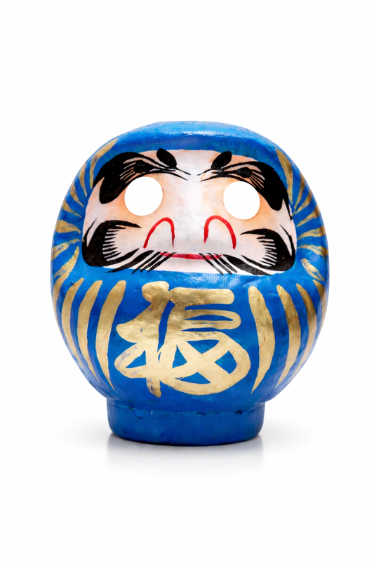 Blue daruma doll.
