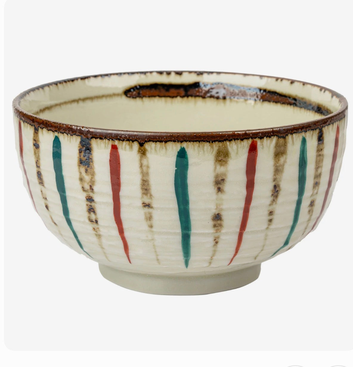 Hand made Japanese Ceramic matcha  bowl with striped design on a white background .Handmade in Japan