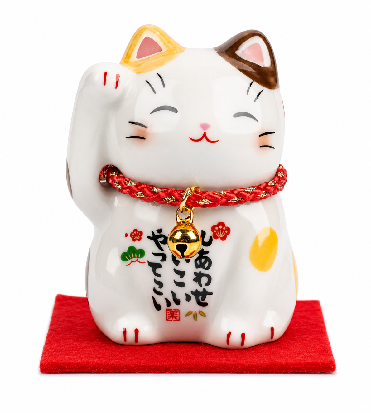 Authentic Japanese Maneki Neko Lucky cat ornament with raised paw, gold bell, red cushion and traditional japanese kanji, made in Japan.