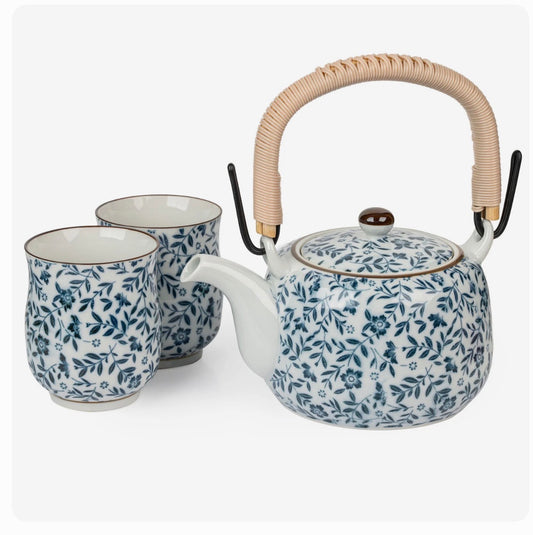 Blue floral japanese tea pot set with blue floral design and matching cups. Made in Japan