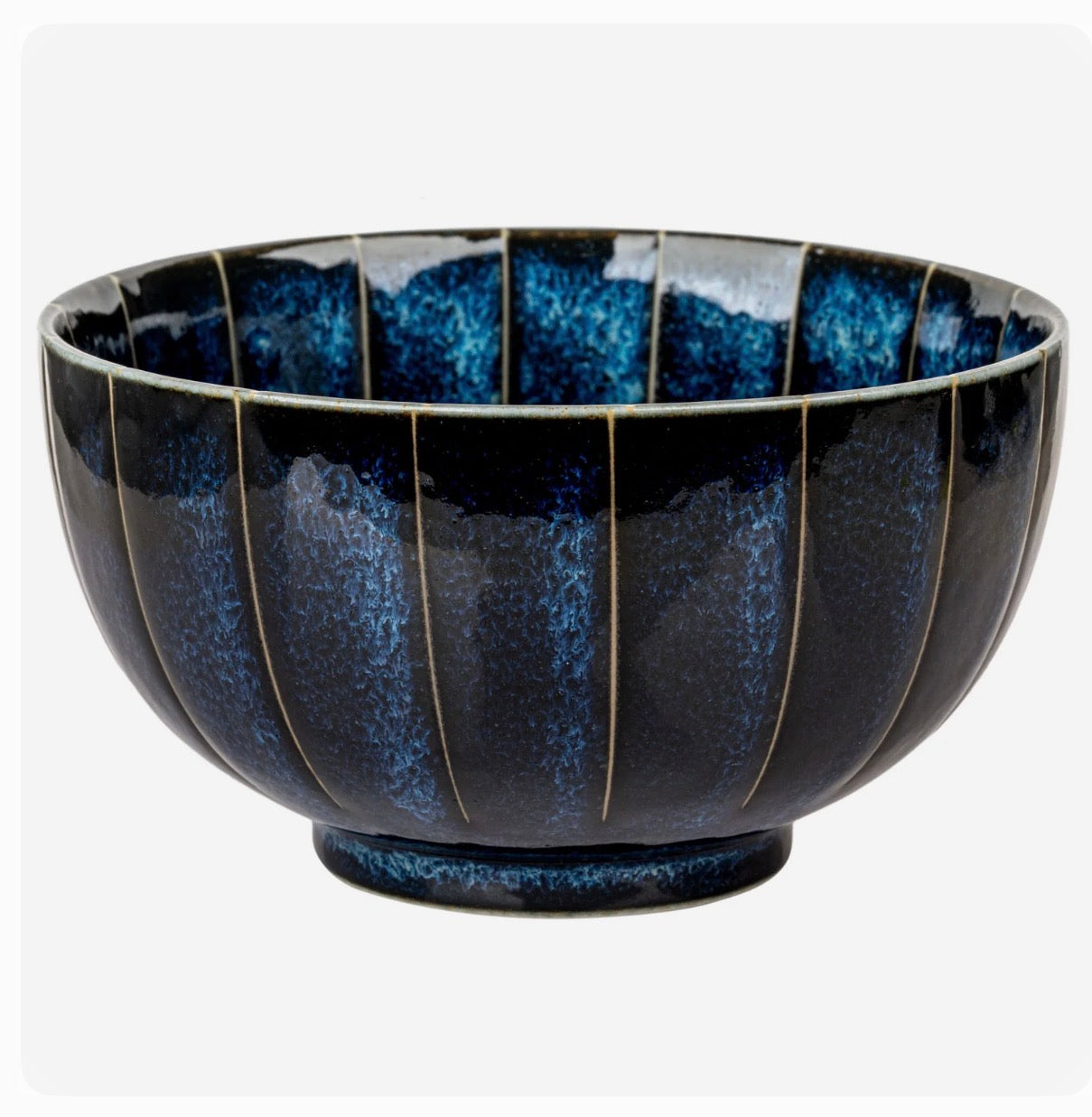 Japanese ceramic bowl with indigo blue glaze and tokusa stripes made in Japan