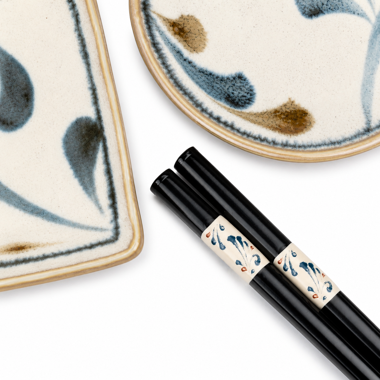 Handcrafted Japanese sushi plate set with elegant blue brush design, ceramic dipping dishes and wood chopsticks