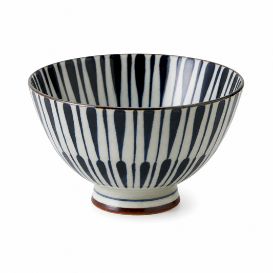 Authentic Kozome Yaetokusa Japanese ceramic rice bowl made in Japan with creamy-grey glaze and indigo-blue geometric pattern.