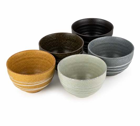 Uzu 5 Piece Japanese Bowl Gift Set made in Japan, featuring five ceramic bowls with traditional swirl designs in assorted artisan glazes.
