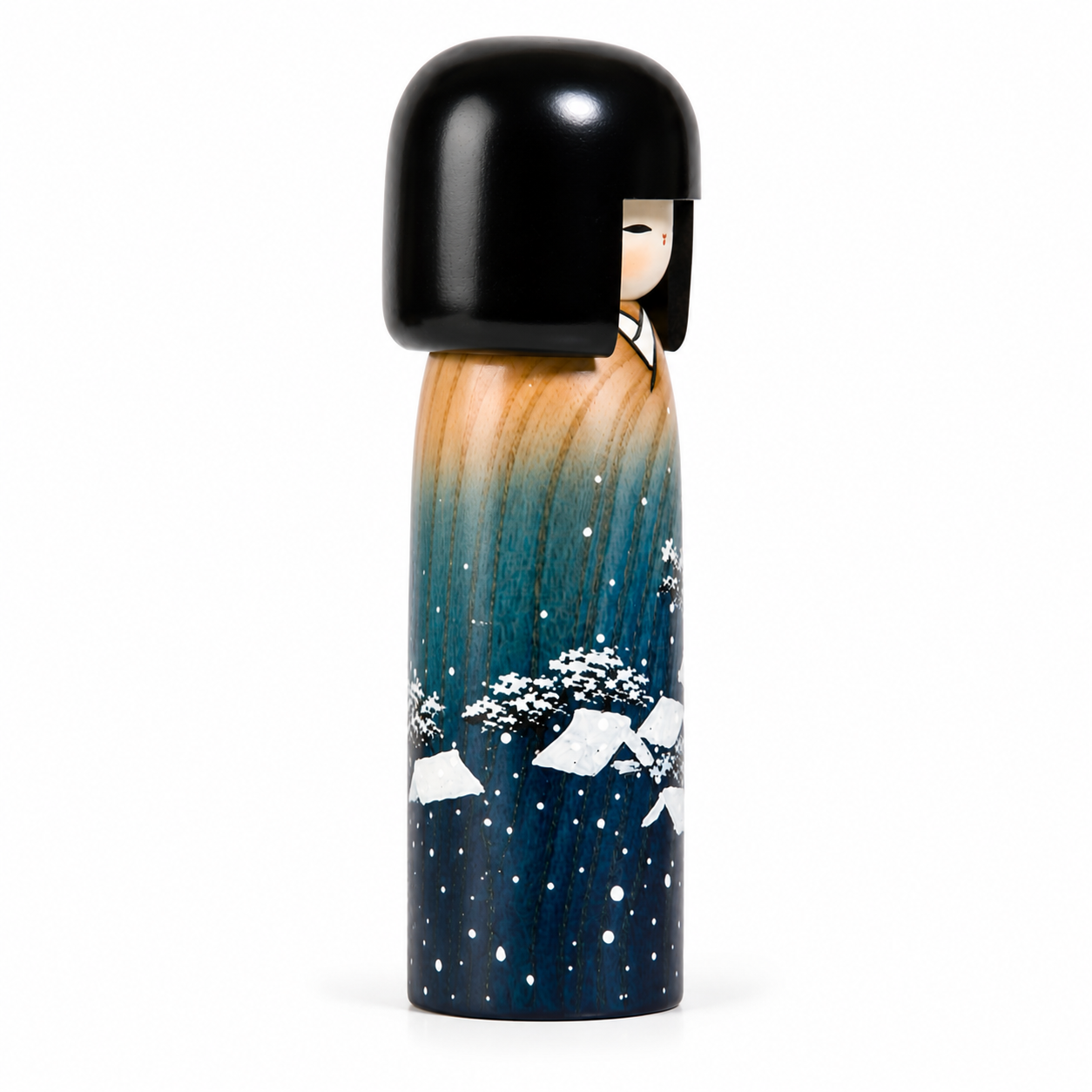Authentic Snow Girl Japanese Kokeshi Doll handcrafted in Japan, decorated with a beautiful winter landscape and traditional hand-painted wooden craftsmanship, perfect for Christmas and seasonal home décor.