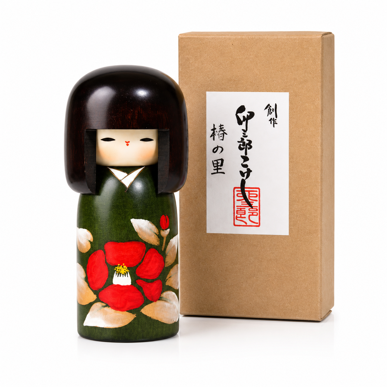    Camellia Flower Wooden Japanese Kokeshi Doll displayed beside its Japanese presentation box.