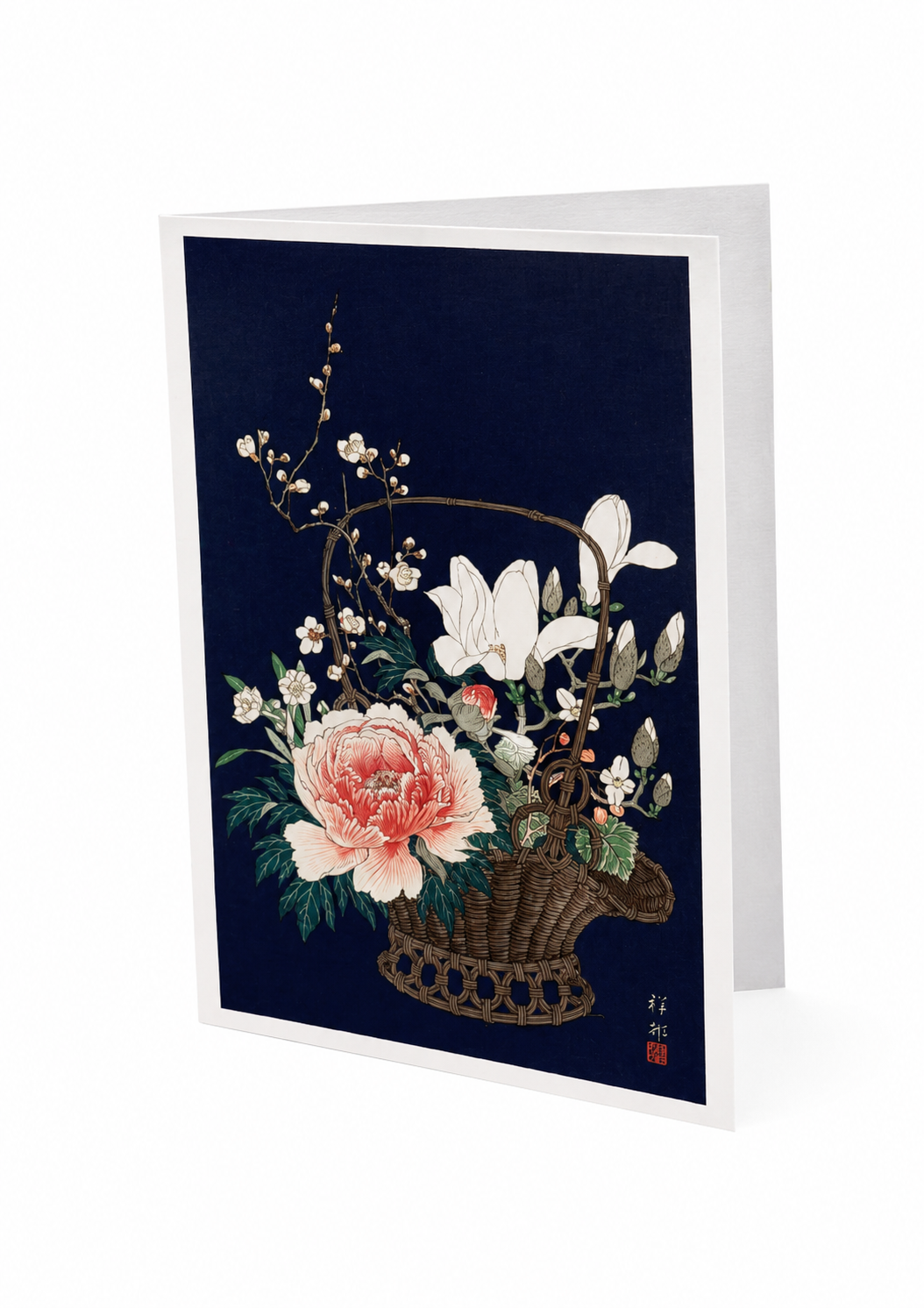 Bamboo Flower Basket Japanese greetings card showing Ohara Koson floral print with pink peonies and white magnolias on a dark navy background, displayed as a folded card