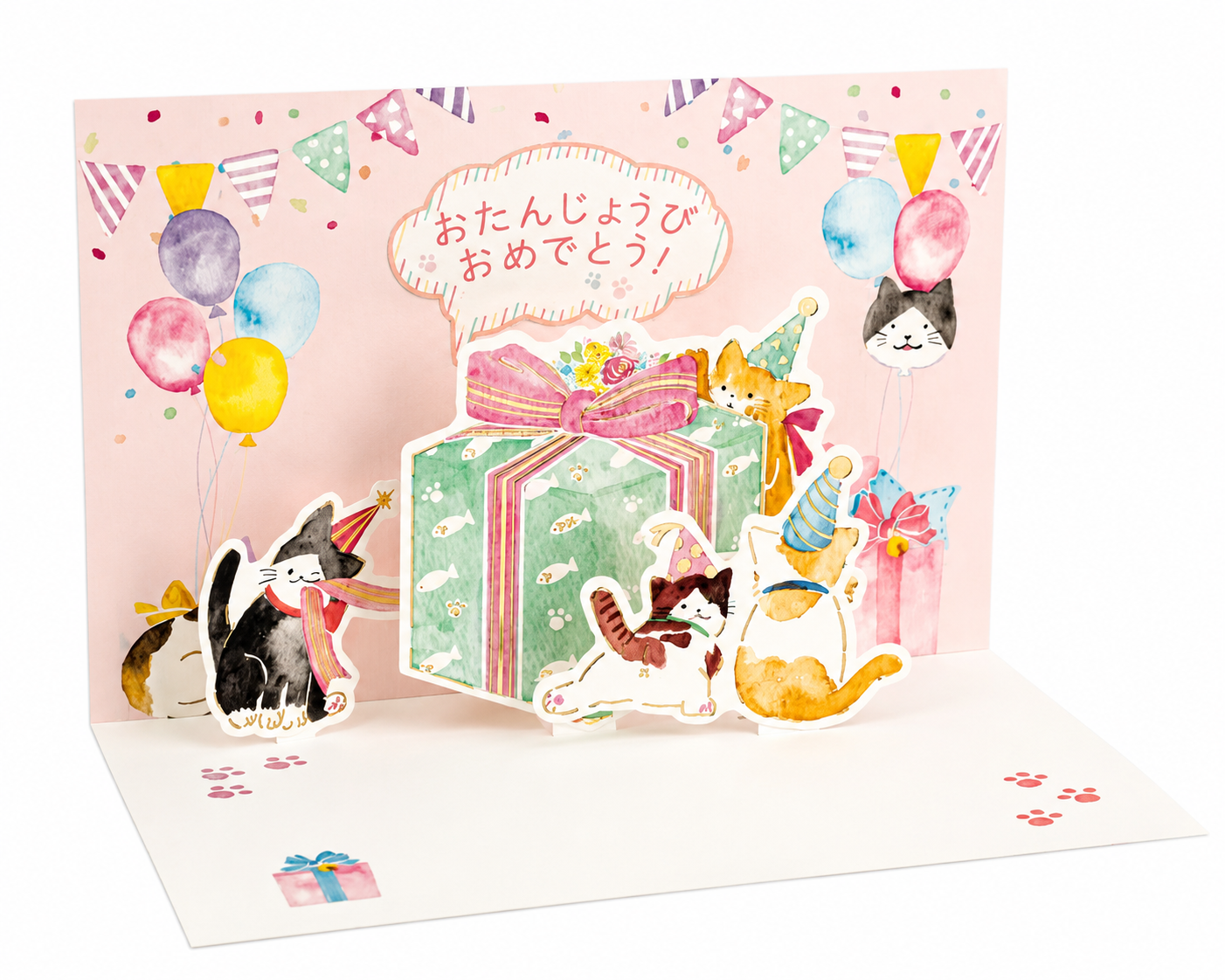 "Front of Lucky Cats Japanese birthday card showing three cats in party hats with colourful gift boxes and bunting, with gold Japanese script 今日はたいせつな日！meaning today is your special day, pink card with gold foil border"