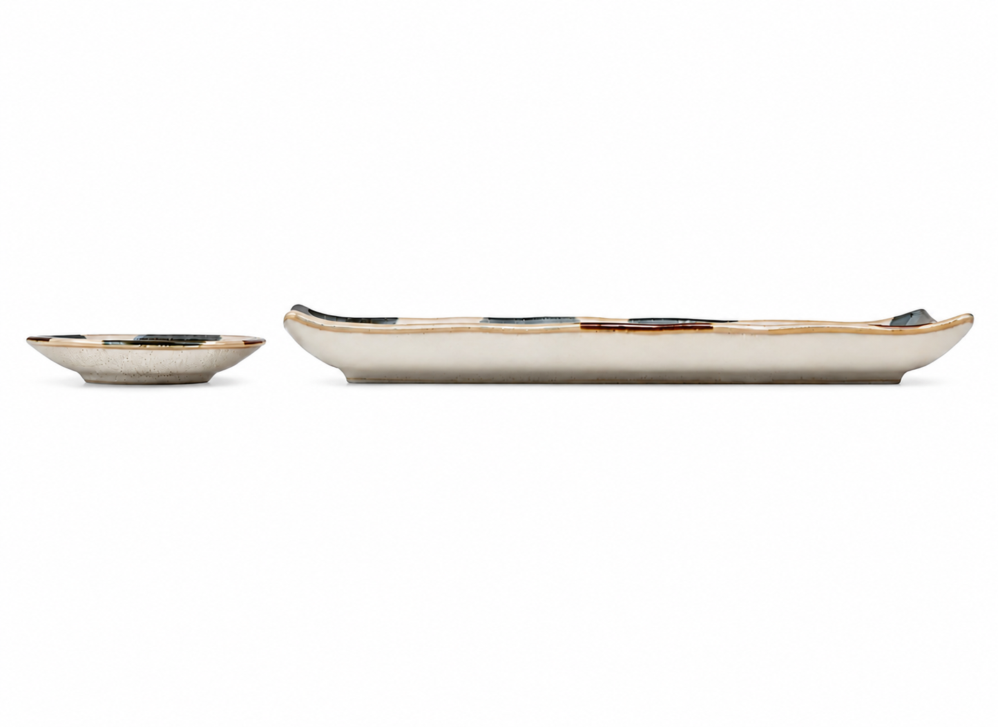 Side profile of oblong ceramic sushi plate and small round dipping dish, cream glaze with gold rim, made in Japan
