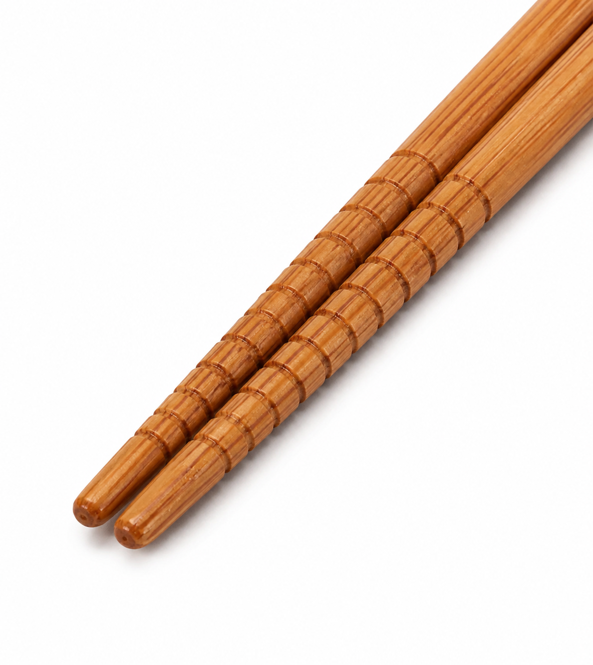 Close-up of ribbed bamboo tips on Japanese saibashi cooking chopsticks, made in Japan