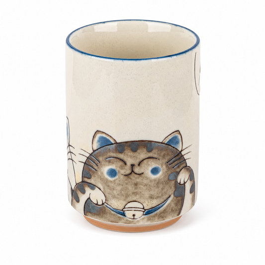 Three Blue Cats Japanese Tea Cup made in Japan – top view showing blue rim and warm earthy-toned interior glaze
