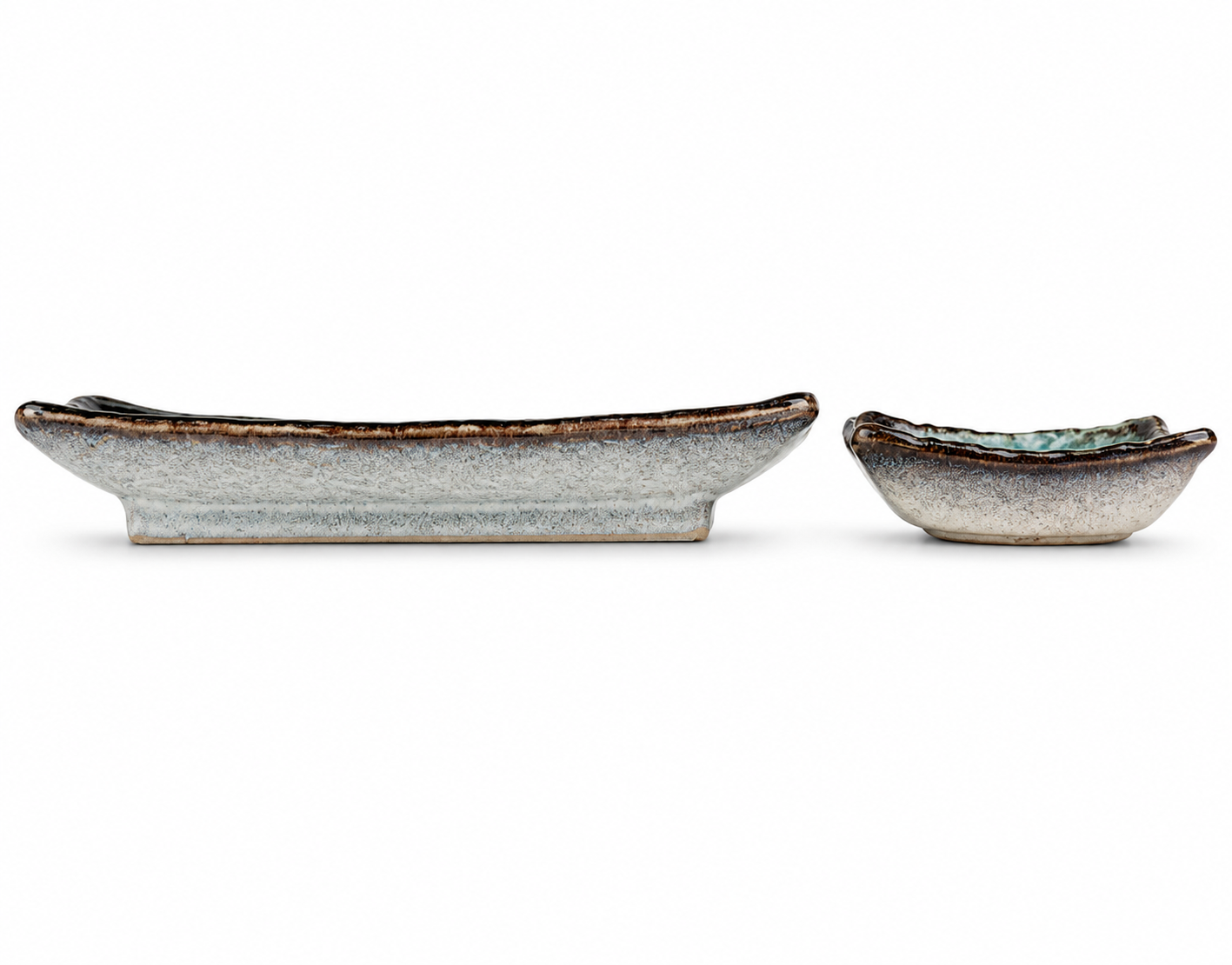 Side view of sea blue crackleglaze Japanese sushi plate and sauce dish showing ceramic base and rustic glaze finish, made in Japan