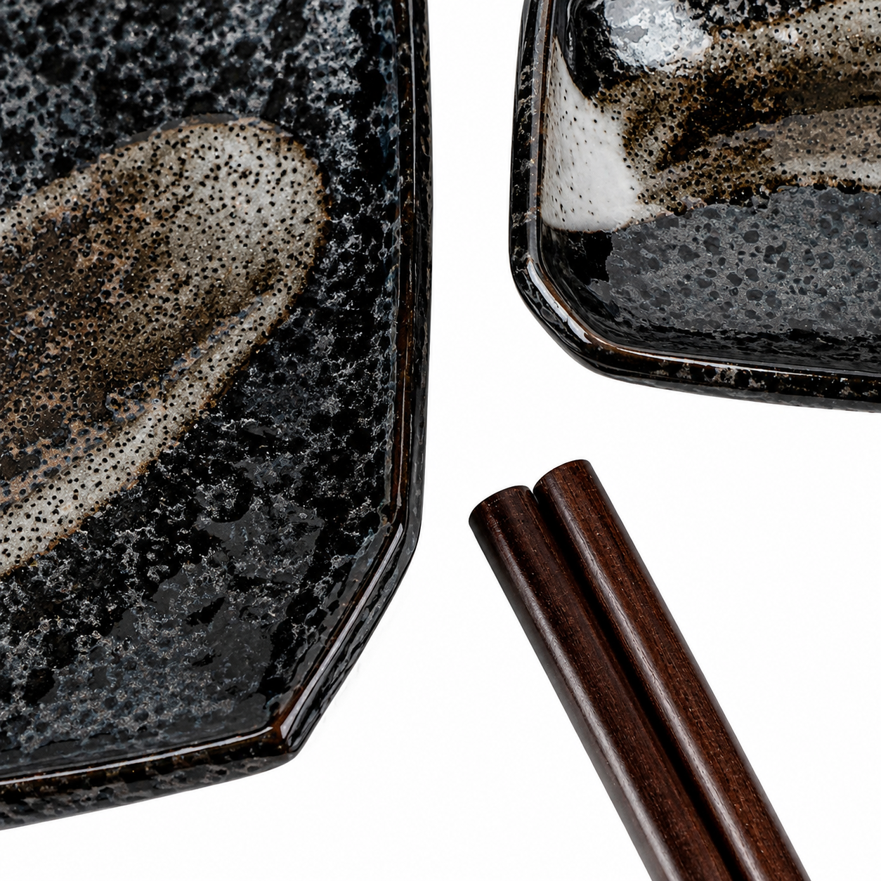 Akeyo ceramic sushi plate — black speckled glaze with silver-grey brushstroke design — Made in Japan"