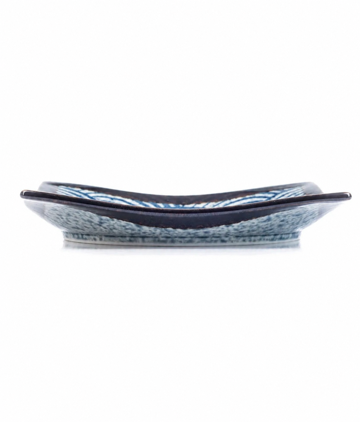 Seikaiha Traditional Japanese Sushi Plate side view showing curved edges and indigo blue wave glaze, made in Japan
