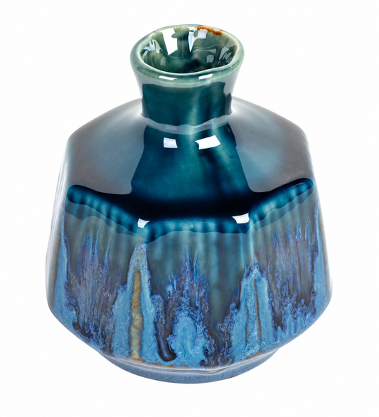 Angled view of Deep Blue Waterfall Japanese Mini Vase with glossy blue glaze, octagonal ceramic body and flared neck.