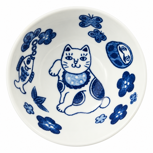 Top view of Fukumaneki Japanese ceramic bowl with blue lucky cat, daruma, fish, butterfly and floral designs.
