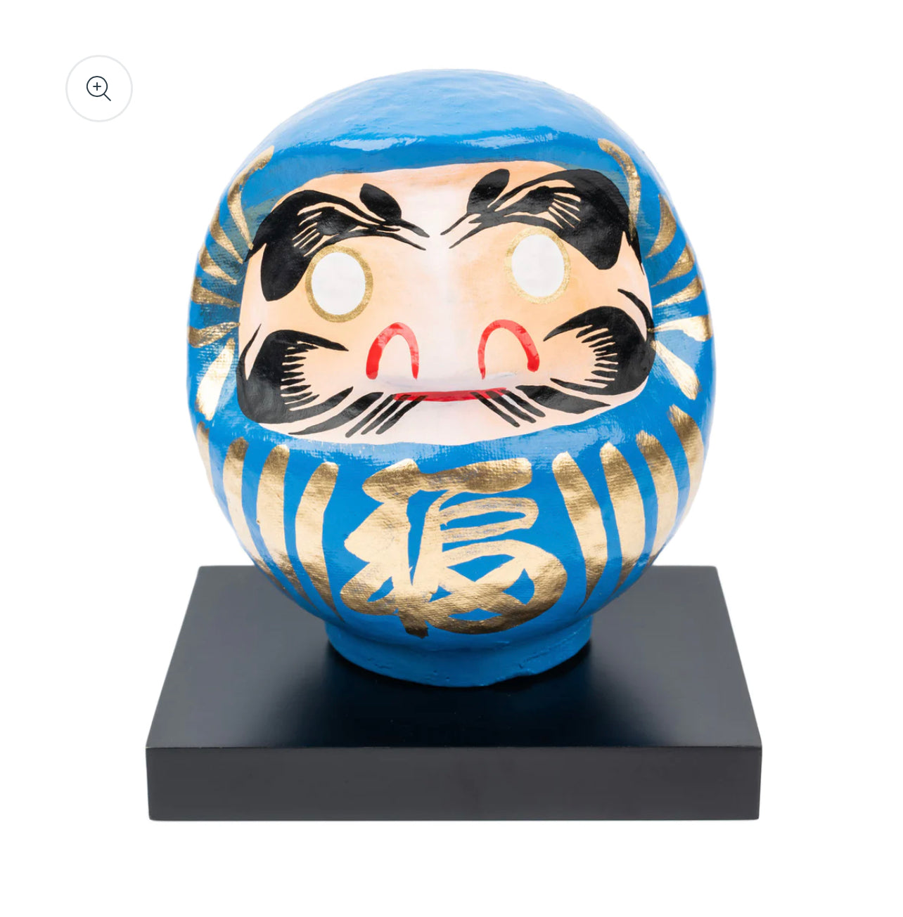 Blue daruma doll.