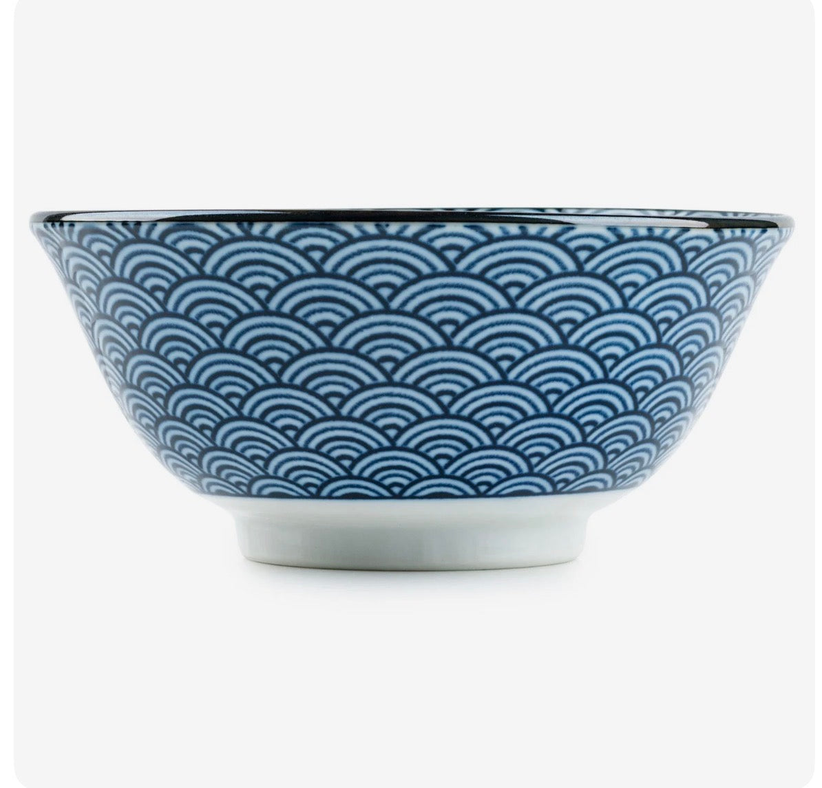 Lucky cat ceramic Japanese bayou soup bowl with blue wave pattern close up