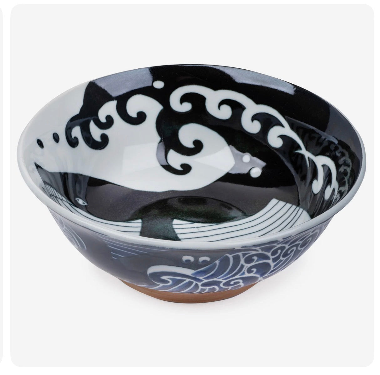 Japanese ceramic ramen bowl with whale design and blue nand black wave pattern
